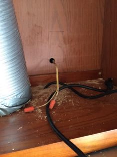Customer had an old, illegal wire for the vent fan. Ran new circuit and installed receptacle. Illegal Wire for the Vent Fan