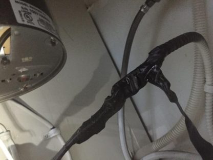 The garbage disposal had been sliced with electrical tape installed plug and new cord. Garbage Disposal Gets a New Cord